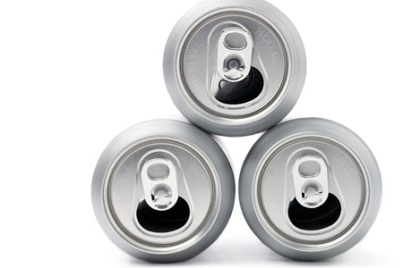 Top view of silver tin cans isolated over white backgroundの写真素材