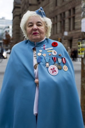 Portrait of a senior woman in blue with medals.のeditorial素材