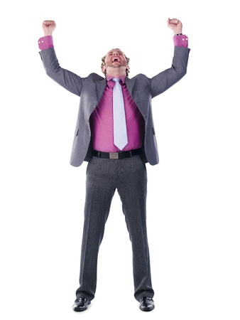 Successful young doctor with hands raised over white background, Model: Derek Gerhardtの写真素材