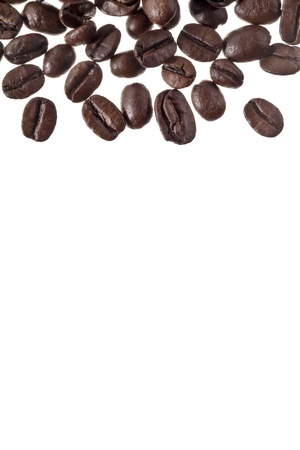 Overhead shot of coffee beans isolated on white surface.の写真素材