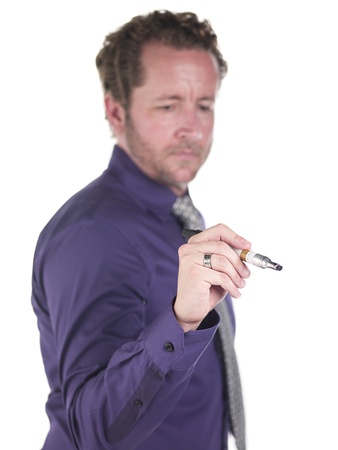 Doctor writing with a marker over white background, Model: Derek Gerhardtの写真素材