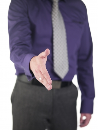 Cropped image of a doctor ready to make a deal over white background, Model: Derek Gerhardtの写真素材