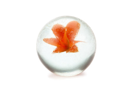 Toy marble isolated in a white backgroundの写真素材