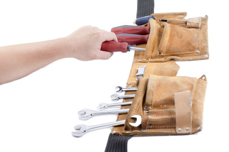 Assorted wrench and screw driver on the tool beltの写真素材