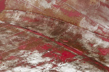 Paint is coming off of a air plane wingの写真素材