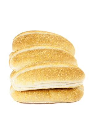 Heap of baguette bread loaf against white backgroundの写真素材