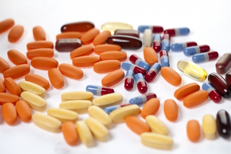 Macro shot of different types of medicines displayed on white background.の写真素材