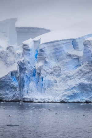 Glowing cracks from the blue icebergの写真素材