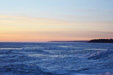 Spring Leningrad Region. Beach on the Gulf of Finland in March 8, 2020.の写真素材