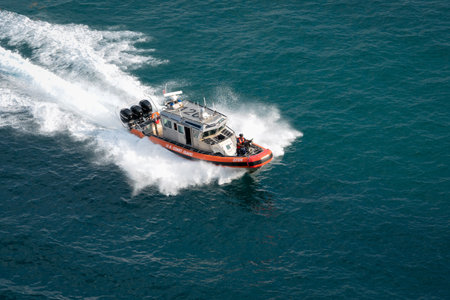 Port Everglades, Ft. Lauderdale - March 17, 2019: United States Coast Guard boat patrols Port Everglades, Floridaのeditorial素材
