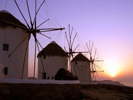 mykonos windmills at sundownの写真素材