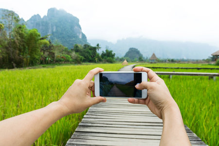 Travel abroad And take photos with mobile.の写真素材