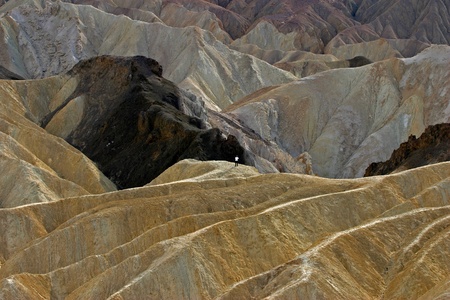 a man at the center of the mountainsの写真素材