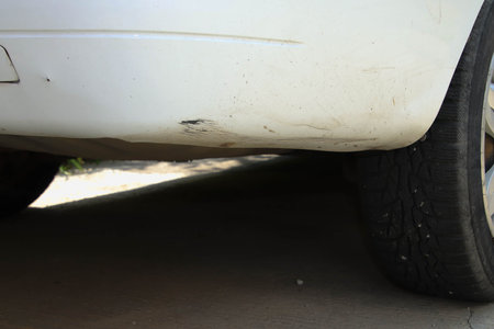 Close-up of dusty headlight.