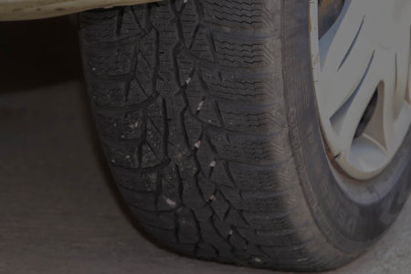 Close-up of dusty headlight.