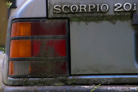 Close-up of dusty headlight.