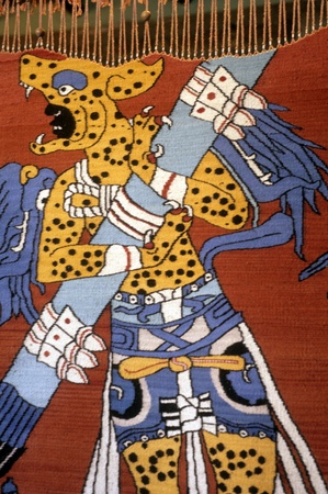 Weaving of a leopard warrior hanging in Tlaxcala, Mexico. の写真素材