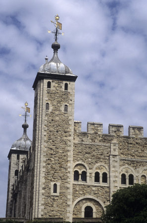 Exterior view of the Tower of London and its weather vane.