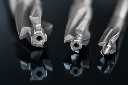 Mill cutters. Drill bit. Artistic detail. Mirroring in glass. Steel countersink cutting tools set....