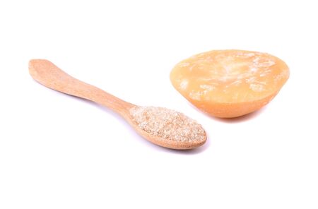 brown sugar coconut sugar isolated on white backgroundの写真素材