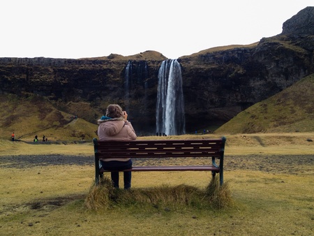 Enjoying Icelandic waterfallの素材