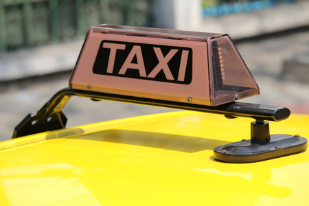 Light on taxi sign not on bright as no passenger or customerの写真素材
