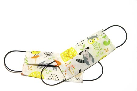 Baby medical mask. Protection children from coronavirus, viruses and microbes. Cute and sweet animals patternの写真素材