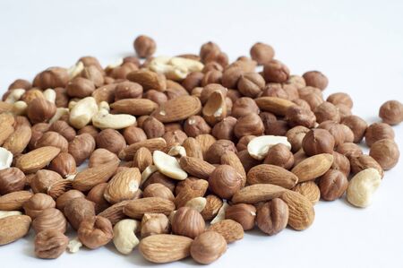 different types of nuts on a white backgroundの写真素材