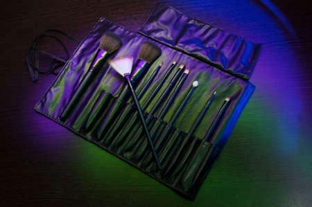 a set of brushes in a leather case for make-upの写真素材