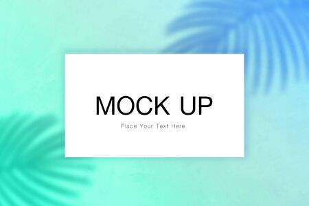 mockup blank card on shadow of palm leavesの写真素材