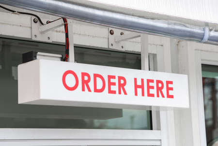 order here sign at cafe restaurantの写真素材