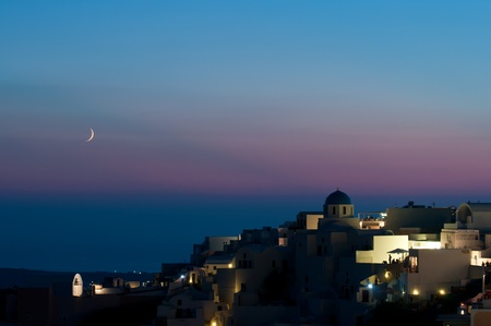 Oia of Santorini after sunset with mooの写真素材