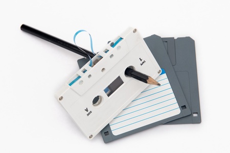 Audio cassette tape and computer floppy disks--- Old and obsolete technologyの写真素材
