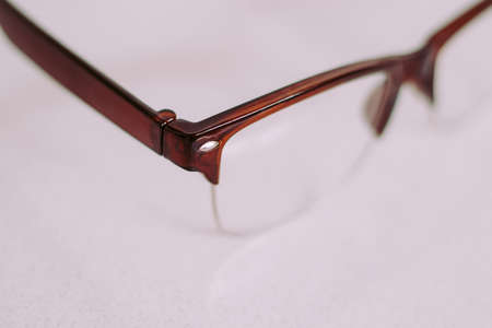 vintage reading glasses on the tableの写真素材