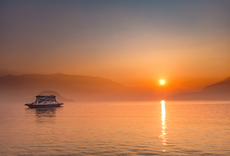 The view of sunset at Como Lake from Varennaの写真素材