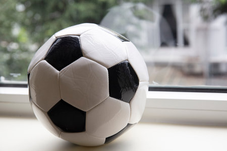 Close up shot of soccer ball on the windowの写真素材