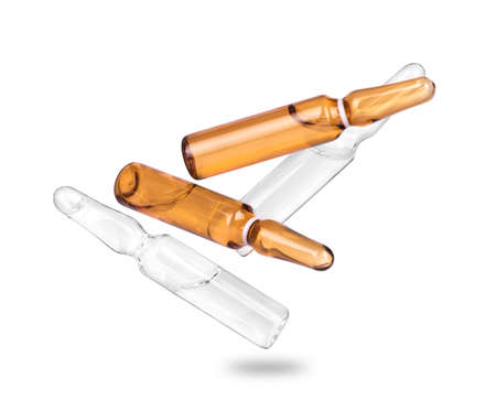 falling ampoules on a white backgroundの写真素材