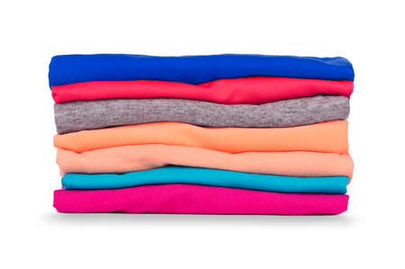 Pile of colorful clothes isolated on white backgroundの写真素材