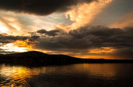 dramatic sunset on the lakeの写真素材