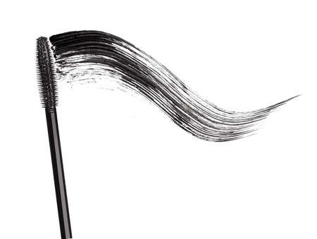 Stroke of black mascara with applicator brush close-up, isolated on white backgroundの写真素材