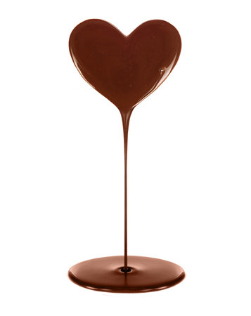 Chocolate stain in the form of heart with flow isolated on white backgroundの写真素材