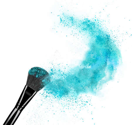 Make up brush with powder splash isolated on white backgroundの写真素材