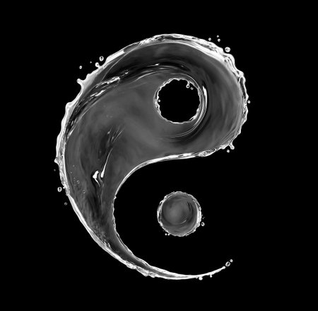 Sign of yin yang made with water splashes on black backgroundの写真素材