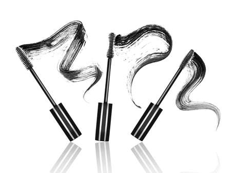 mascara brushes with mascara strokes, isolated on white backgroundの写真素材