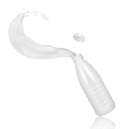 Milk splashing out of plastic bottle, isolated on white backgroundの写真素材