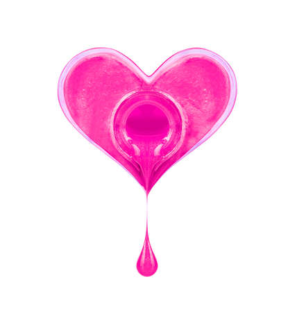 Close up of a nail polish bottle in the shape of a heart and flowing drop on white backgroundの写真素材