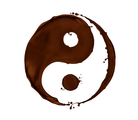 Chocolate splashes in the shape of a Yin Yang symbol, isolated on a white backgroundの写真素材