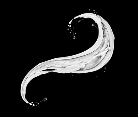 Splashes of cream with fresh water on black backgroundの写真素材