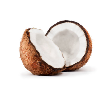 Two pieces of coconut close-up on a white backgroundの写真素材