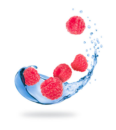 Raspberries with splashes of fresh water close-up on white backgroundの写真素材